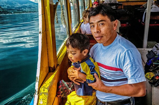Father and Son Crossing Atitlan-Guatemala