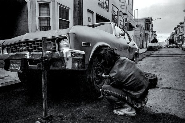 Fixing a Tire on Natoma Street-USA Sheet #23